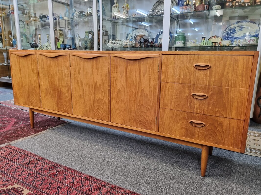 Mid Century Teak Sideboard with 4 cupboards, 3 drawers by Chiswell c.1969